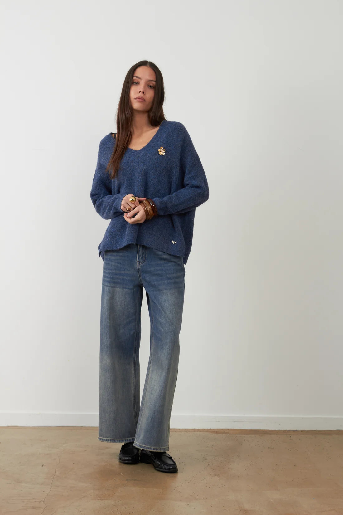 Orfeo Lam V-neck sweater with Lam flower jewel brooch
