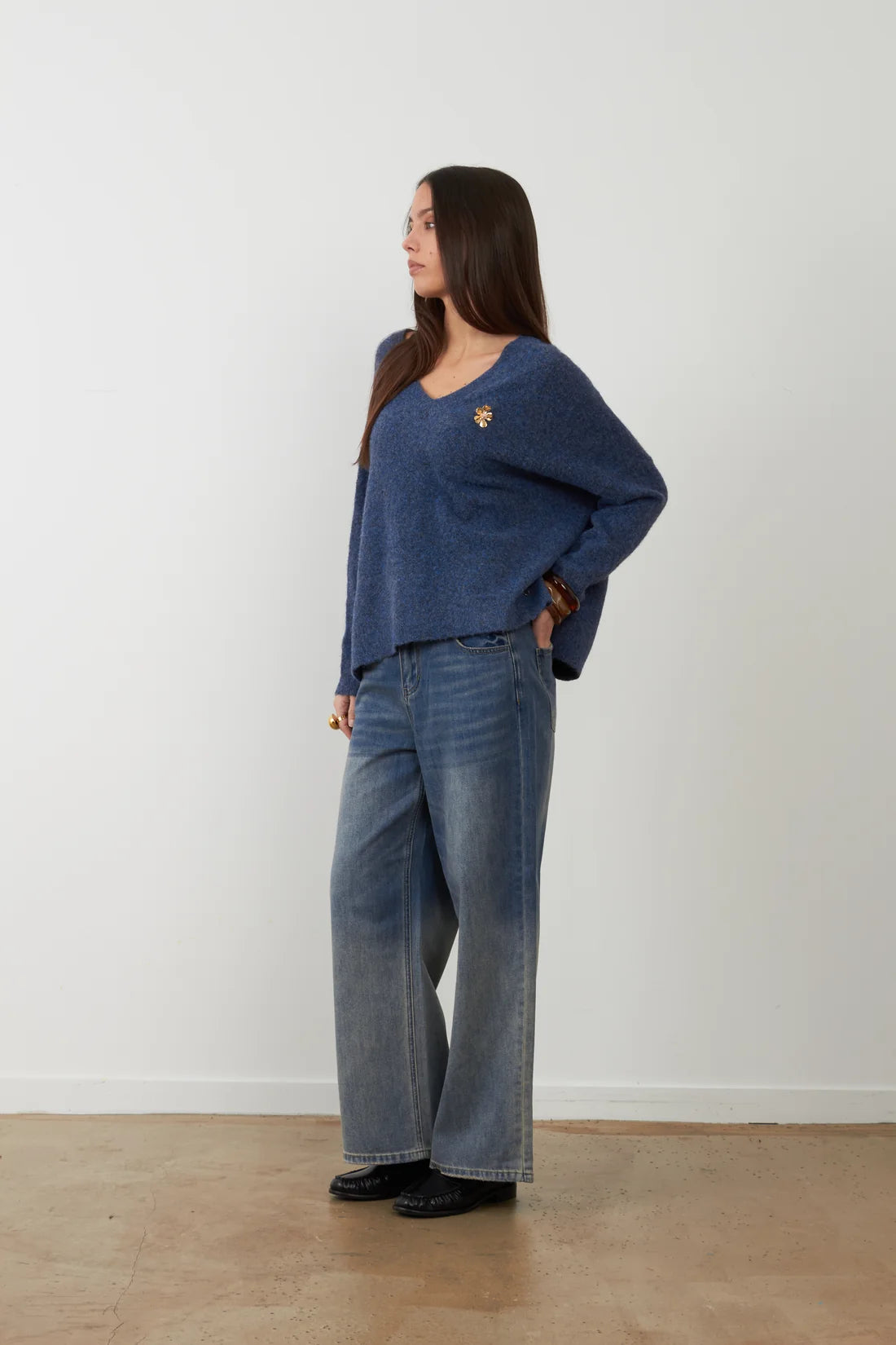 Orfeo Lam V-neck sweater with Lam flower jewel brooch